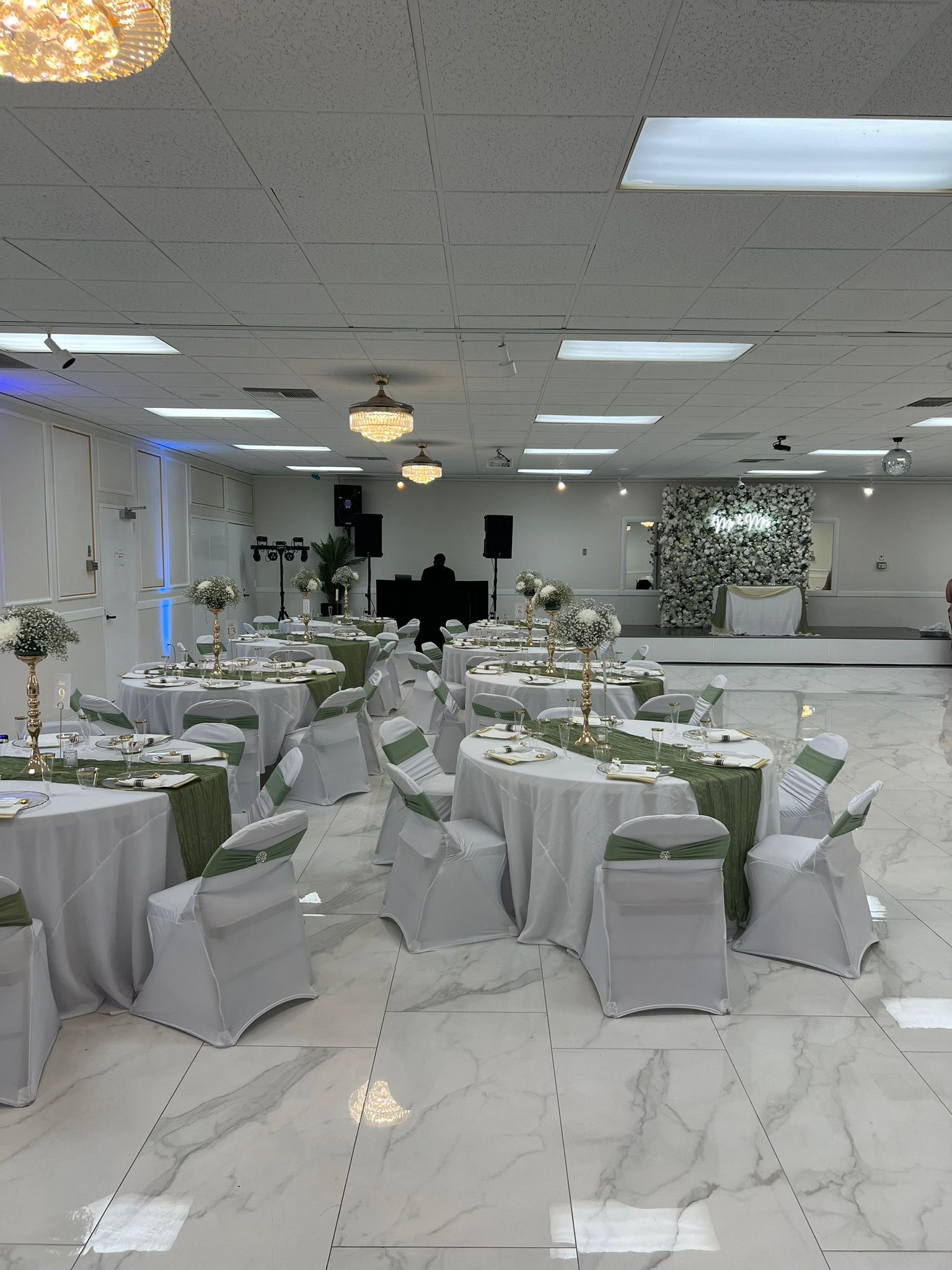 Grand banquet hall green and white setup